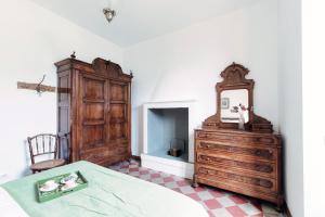 Postel nebo postele na pokoji v ubytování Villa Eugenia Suite - by MyHomeInComo