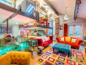 a living room with two couches and a table at The Engine Room in Malham