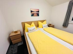 Postel nebo postele na pokoji v ubytování Haus Helga