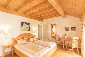 Postel nebo postele na pokoji v ubytování Hotel Leander