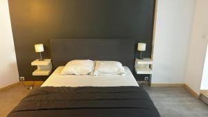 Postel nebo postele na pokoji v ubytování T2 proche centre et plage perros guirec