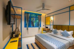 Postel nebo postele na pokoji v ubytování Shalom Backpackers Shimla