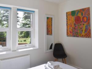 Postel nebo postele na pokoji v ubytování Rose Cottage