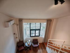 Prostor za sedenje u objektu Guilin Camphor Country House -Free pick up service