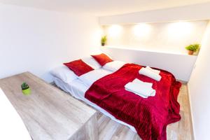 Posteľ alebo postele v izbe v ubytovaní UrbanNest + 26 fotografií