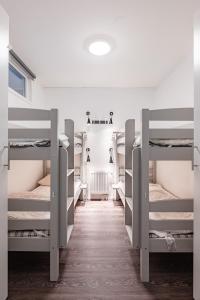 a room with three bunk beds in a room at Full apartment with sauna, Kungsberget in Järbo