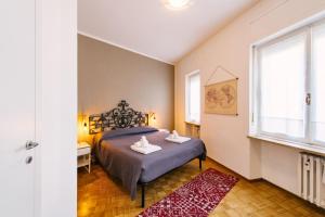 Posteľ alebo postele v izbe v ubytovaní Residenza Le Mura
