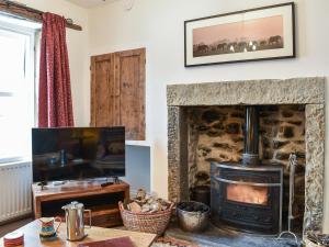 TV a/nebo společenská místnost v ubytování Kings Cottage