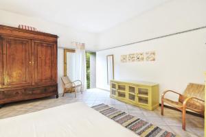 Postel nebo postele na pokoji v ubytování Casa di Charme, Rio nell'Elba