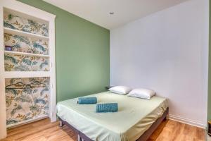 En eller flere senge i et værelse på L'élégance Urbaine - Villeurbanne - Proximité Lyon