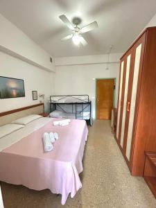 Postel nebo postele na pokoji v ubytování Hotel Caracas
