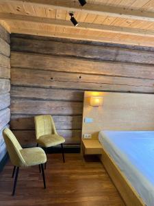 Postel nebo postele na pokoji v ubytování Rakari