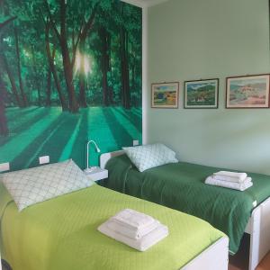 Postel nebo postele na pokoji v ubytování Il Guasco Rooms
