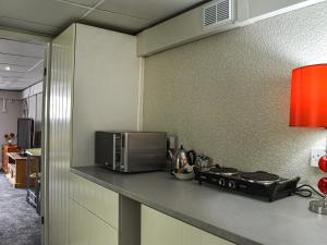 Η κουζίνα ή μικρή κουζίνα στο Apartment 786 At The Granville