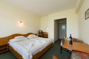 Posteľ alebo postele v izbe v ubytovaní Hotel Nostra