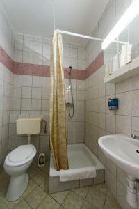 Koupelna v ubytování Hotel Nostra