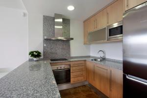 Кухня или мини-кухня в Pierre & Vacances Empuriabrava Marina
