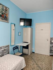 TV a/nebo společenská místnost v ubytování Mini Room Pero
