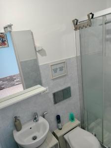 Koupelna v ubytování Mini Room Pero + 3 fotografie