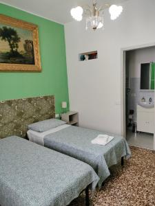 Postel nebo postele na pokoji v ubytování Mini Room Pero