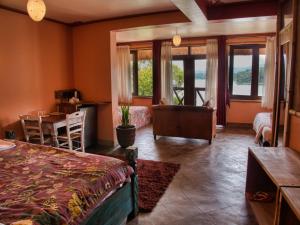 Katil atau katil-katil dalam bilik di Birdnest Resort