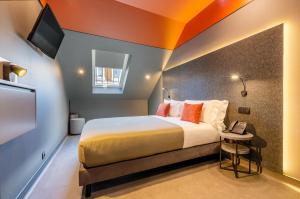 LX Arch Hotel客房内的一张或多张床位