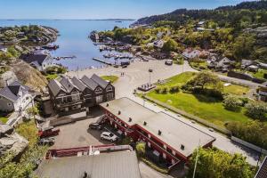 an aerial view of a small town with a marina at Ula seaview suite in Larvik