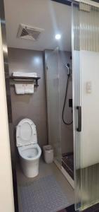 Koupelna v ubytování Changsha AquaEdge Hotel Wuyi Square长沙悦己阅湘江酒店