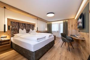 Letto o letti in una camera di Hotel Edenlehen