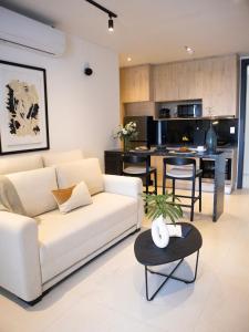 A cozinha ou kitchenette de Divina Tower Apart Hotel