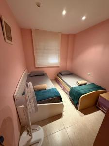 Postel nebo postele na pokoji v ubytování Apartamento S&L