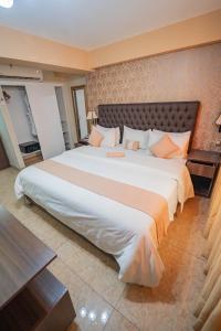 Postel nebo postele na pokoji v ubytování Gran Recreo Hotel - Trujillo - Perú