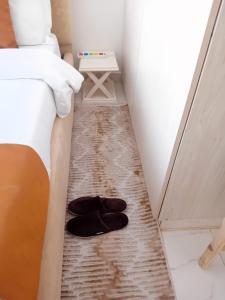 Ένα ή περισσότερα κρεβάτια σε δωμάτιο στο Belaire Bnb one bedroom in Thindigua kiambu road +9 φωτογραφίες