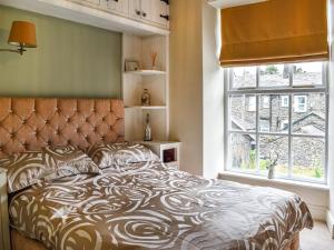 Postel nebo postele na pokoji v ubytování Orchard House