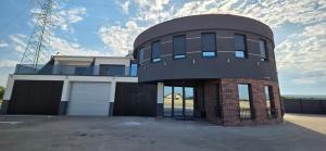 a circular house with a brick at SEE YOU Apartments in Niš