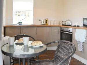 Köök või kööginurk majutusasutuses Maisie's Cottage