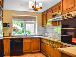 Kuchyň nebo kuchyňský kout v ubytování Court House