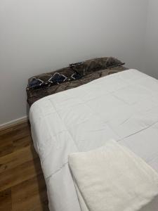 Postel nebo postele na pokoji v ubytování Chalcot
