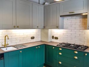 Kuchyň nebo kuchyňský kout v ubytování Orchard House