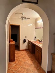a bathroom with a sink and a bath tub at The House of Angels in Las Conchas +19 photos
