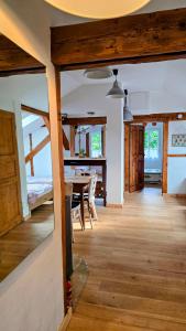 a room with a table and a dining room at Ferienwohnungen Otus in Winningen