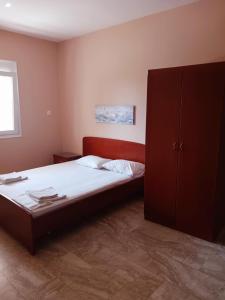 Postel nebo postele na pokoji v ubytování Menis Haus Rooms