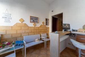 TV a/nebo společenská místnost v ubytování "L'Oasi di Favignana" Room and Charme