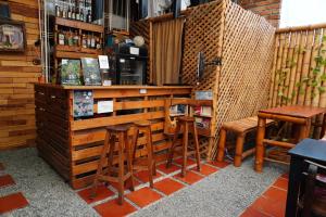 Lounge nebo bar v ubytování Kimaná Hostal