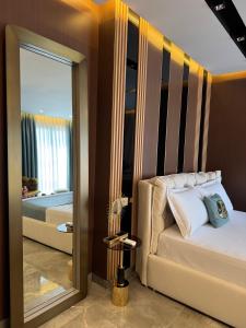 Postel nebo postele na pokoji v ubytování Hotel Qetesia-Te Indriti