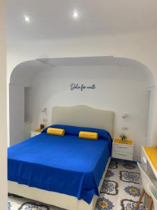 Postel nebo postele na pokoji v ubytování La Piccola Suite