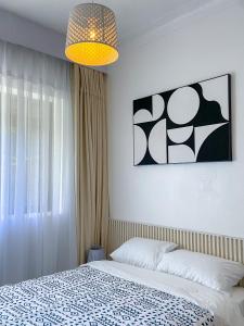 Postel nebo postele na pokoji v ubytování kololo's gem