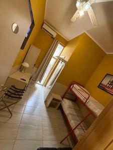 Postel nebo postele na pokoji v ubytování Guest House Hola Roma + 6 fotografií