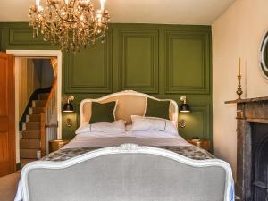 Postel nebo postele na pokoji v ubytování Orchard House