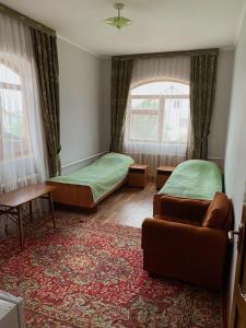 Ένα ή περισσότερα κρεβάτια σε δωμάτιο στο VIZITik +18 φωτογραφίες